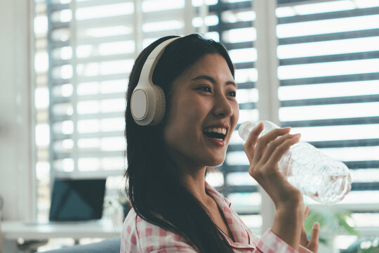 Woman enjoying life at home, promoting healthy eating, wellness, and a balanced lifestyle. Concept of natural nutrition, mindfulness, and modern healthy living.