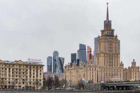 Moscow, Russia &ndash; April 20, 2026: Stalinist skyscraper Hotel Ukraina  and Moscow City skyline with modern towers.