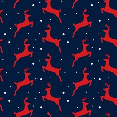 Seamless Christmas pattern with red reindeer and snowflakes © rahayu