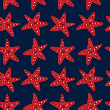 Seamless pattern of red starfish on dark blue background