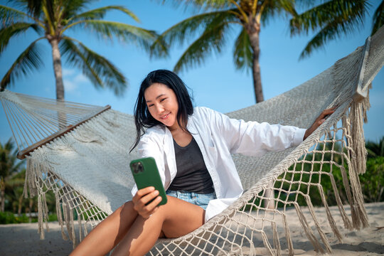 Representing reliable travel assistance, connectivity at a peaceful beach resort on summer vacation