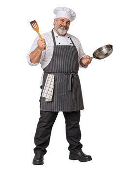 Bearded chef holding a frying pan and wooden spatula while wearing a white hat and striped black apron isolated on transparent background