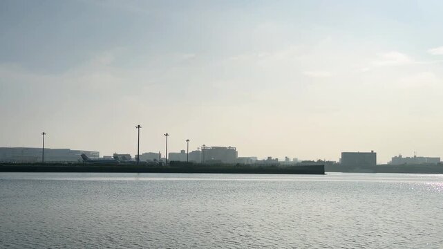 Hazy Waterfront Industrial Landscape Across Tokyo Bay in Soft Afternoon Light