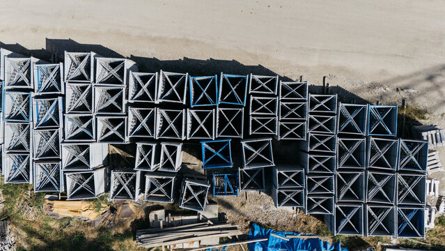 Aerial view of stacked metal construction frames at the TASYAPI site in Kuzmin, Vojvodina, Serbia.