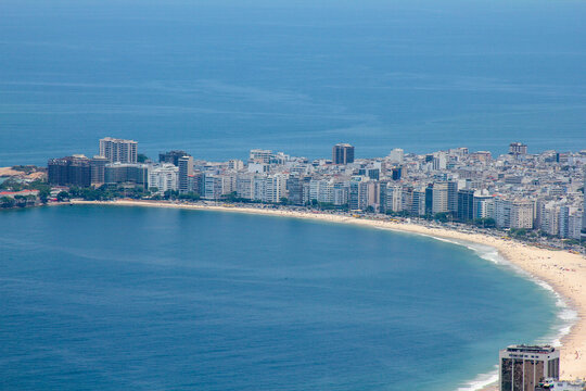 Aerial view of the coastline and high-rise buildings along the beach in Rio de Janeiro, Rio de Janeiro, Brazil.