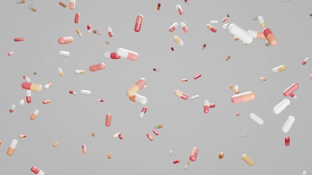 Seamless loop pills capsules falling grey background medicine pharmacy red ideal for pharmacy advertising healthcare presentations medical websites and vitamin supplement promotions