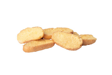 Fototapeta premium Crisp toasted oval bread rusk slices scattered on white background