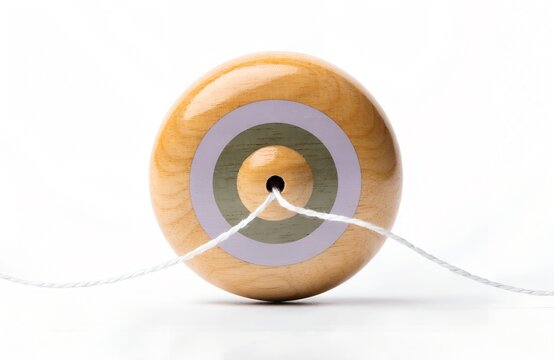 Wooden yo-yo toy with colorful concentric circles and white string