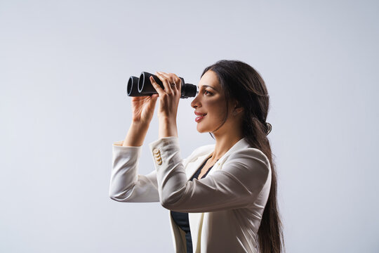  Signpost - business woman with binoculars where to look. Business analytics and strategic. Find a way.