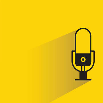 microphone icon with shadow on yellow background