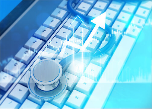 Medical stethoscope resting on a computer keyboard representing digital health and telemedicine technology.