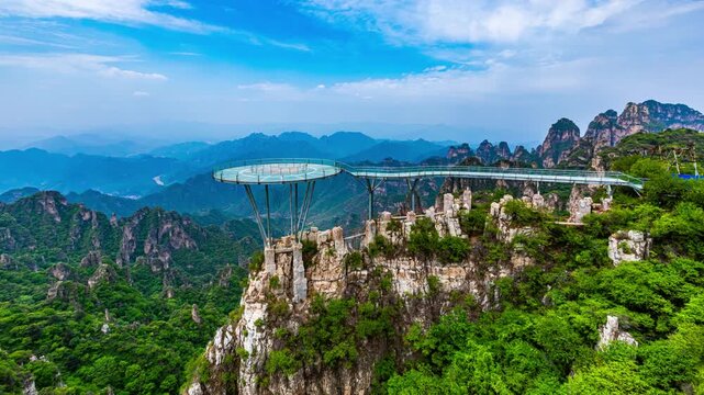 Glass Skywalk Platform Over Green Mountain Valley Landscape in China