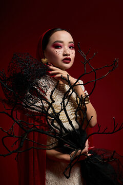 Elegant vampire queen look with pearls and gothic flair for Halloween