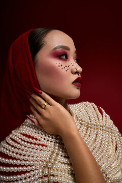 Elegance and allure of an Asian vampire queen in a stunning Halloween look