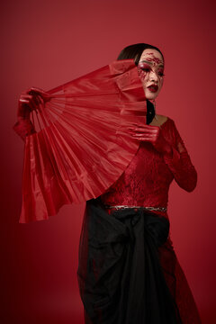 Dark beauty queen, an asian woman embraces spooky charm for Halloween