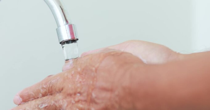 Washing hands under clean running tap water, hand hygiene, cleanliness, infection prevention, healthcare and daily routine, close-up