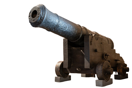 Antique naval cannon on a wooden carriage isolated on a white background.