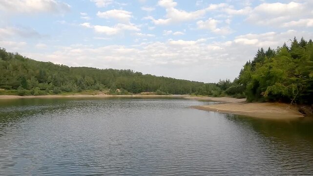 Scenic shoreline and forest at Seliste lake on Goc mountain, Serbia