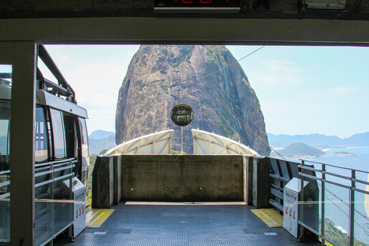 View of Sugarloaf Mountain seen from the cable car station, with the metal platform and iconic peak in the background under a clear sky in Rio de Janeiro, Rio de Janeiro, Brazil.