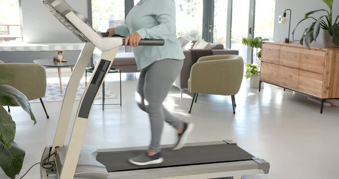 Lifestyle videos indoor of people doing activities at office, exercising on treadmill, person walkin
