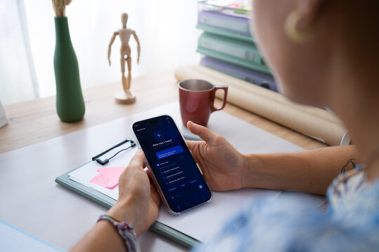 White person using ai assistant app on smartphone