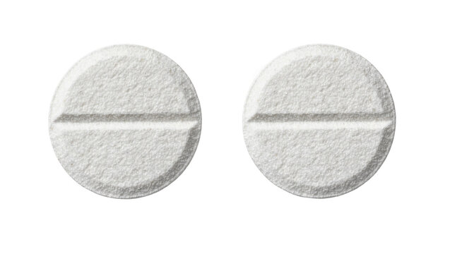 Two round white pills with scored lines, isolated on transparent background