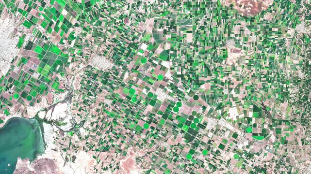 Aerial view of the coastal agricultural landscape of Sinaloa, Mexico, illustrating the relationship between farmland, rural settlements and the Pacific coast