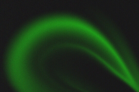 Abstract glowing green arc on black background, dynamic curved light beam or laser trail texture, neon digital art element