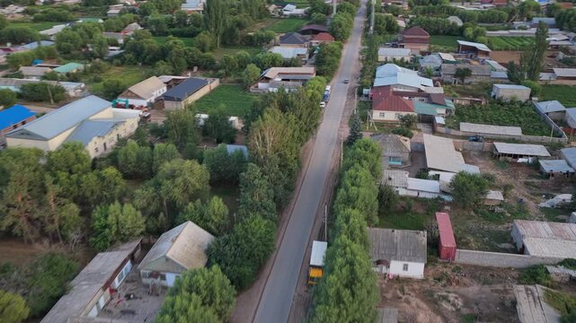 Aerial view of a village road in Ysyk Kol, Kyrgyzstan.