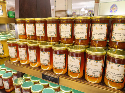 Close up of jars of Seville Orange marmalade in Harrods Food Hall, London, UK