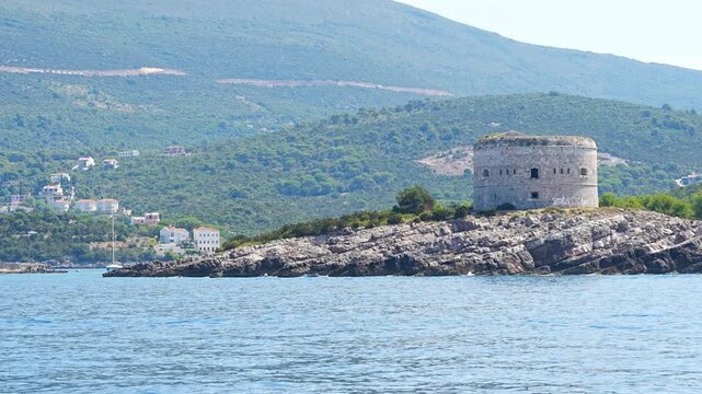 Historic Arza Fortress on the Lustica Peninsula in Montenegro on the Adriatic Sea. Military architecture overlooking the Bay of Kotor and protecting the coastal entrance.