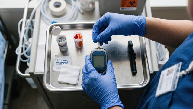 Health Worker Preparing Diabetes Monitoring Supplies for Clinical Care Routine