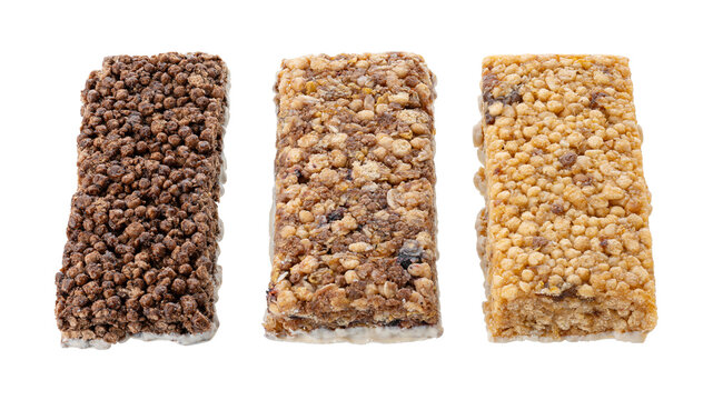 Three different granola bars with white chocolate yogurt bottom isolated on white background. Healthy cereal muesli bars with chocolate, oats and berries.