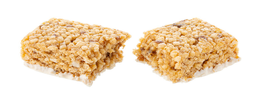 Oat and nut bar isolated on white. Granola bar. Healthy sweet dessert snack. Cereal granola bar with nuts, fruit and berries. Healthy munchies. 