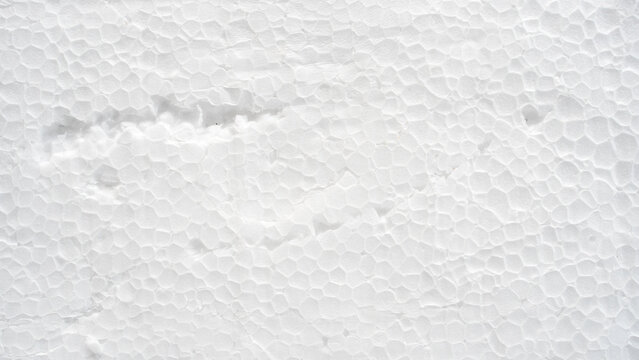 White damaged styrofoam texture background macro detail with dent and scratch full frame