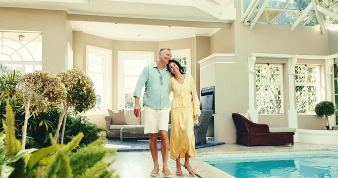 Happy, couple and walking with love in resort for holiday getaway, vacation or honeymoon trip. Mature, man and woman bonding for travel, accommodation or romantic date with pool in luxury retreat