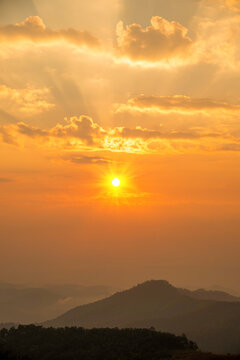 Vertical Dramatic sunset golden red sky scenic landscape sunrise dawn heaven. Vertical Horizon Golden sky sunrise dramatic beautiful landscape view. Dawn sky gold dusk time cloudscape with sunlight