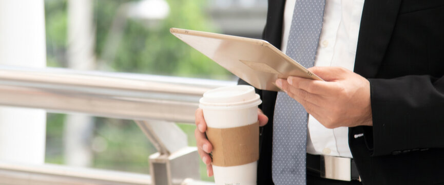 Banner man hand using digital tablet smartphone. Hands holding smart digital tablet touch screen shopping online call text message. Banner man hand using smartphone internet of things with copy space