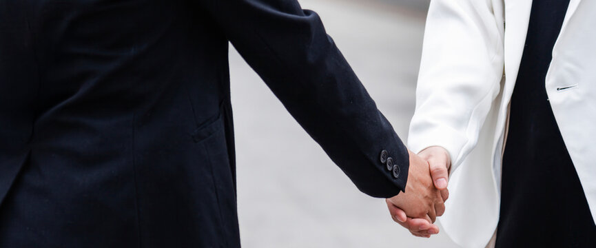 Banner hands high five Fist bump Volunteer mission business partner with copy space. Two people multiracial high five hands stack join arm together. Team bump fist together. Hand High Five Business