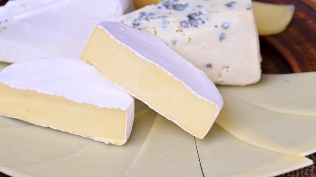 cheese mix featuring Parmesan, Brie, blue cheese, and Camembert.