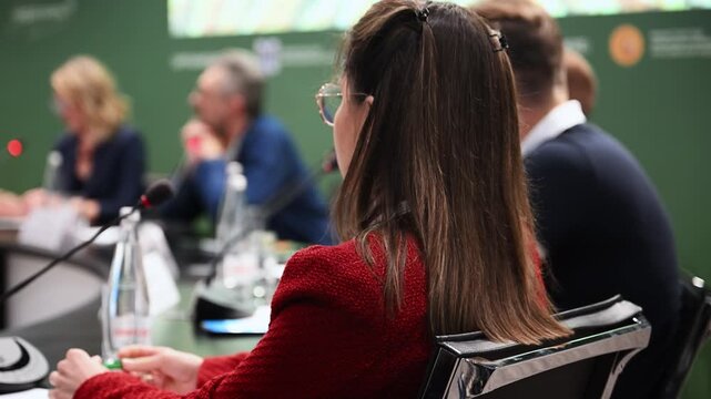 Business conference with speakers and participants during a professional discussion. Universal corporate event concept for communication, strategy, teamwork and business meetings.