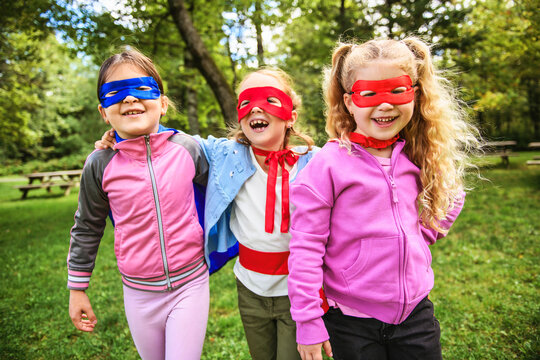 Group kids friends Superhero playing togetherness and having fun outdoor