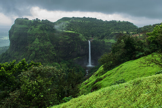 Kumbhe Waterfall, a scenic 178-foot (60-meter) high waterfall located near Kumbhe village, lush and green Sahyadri ranges, Western Ghats, Mangaon, Raigad district, Maharashtra, India.
