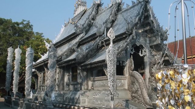 Wat Sri Suphan famous Silver Temple in Chiang Mai city, Thailand, decorated with metal reliefs and Buddhist motifs. Thai architecture, Lanna craftsmanship, religious tourism and Southeast Asia travel