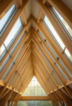 Sustainable architecture and biophilic design, modern wooden roof structure with glass skylights in a bright eco-friendly building interior
