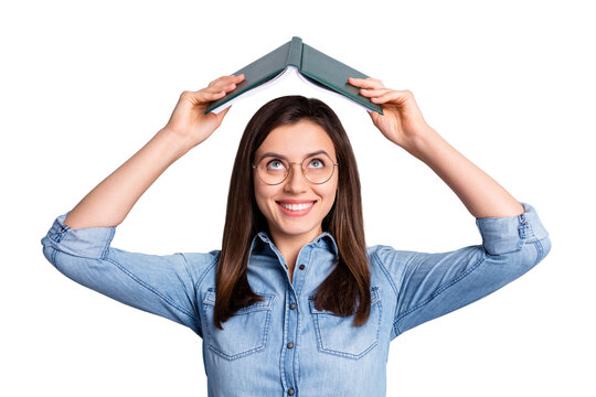 Close up photo of cool funky lady look at open book above head wear spectacles blue cloth isolated on grey background