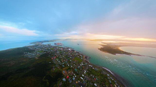 Aerial shots of the sunset over the bay town, Bluff, New Zealand