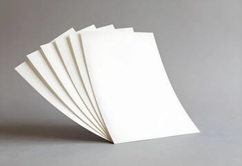 Obraz premium Branding and stationery mockup, blank white paper sheets for corporate identity design and marketing communication on a neutral grey background