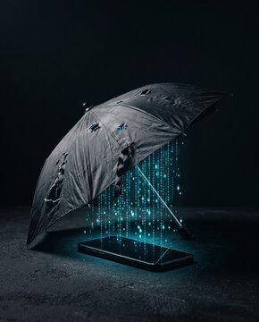 Torn umbrella leaking glowing data over a smartphone