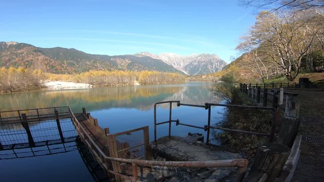 Taisho Pond has a beautiful surface which reflects the Hotaka Mountains, and with surrounding scenery symbolizing of Kamikochi national park.
